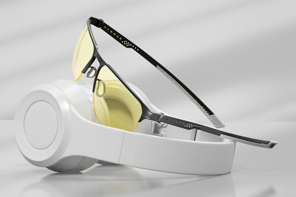 GUNNAR Echo Onyx glasses with Amber lenses resting on a white gaming headset